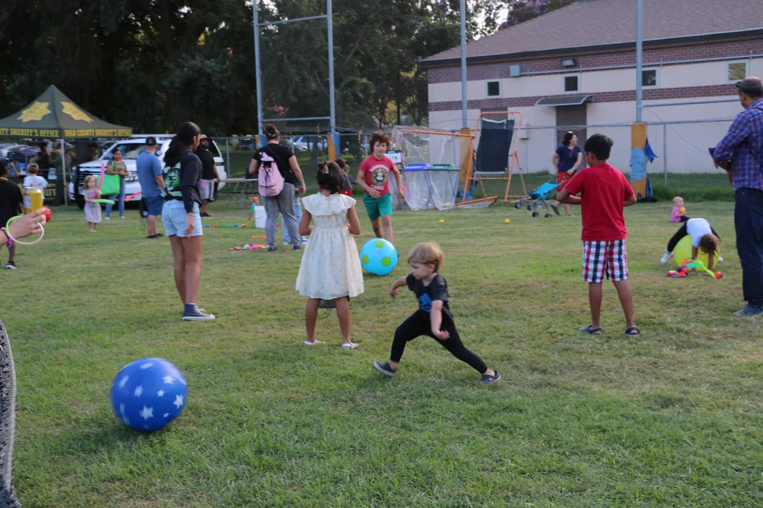 Kids playing games and sports on the field